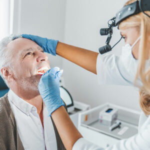 A periodontal patient gets an exam